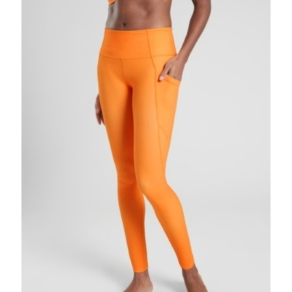 Athleta Pants - NWOT Athleta Orange Salutation Pocket Leggings